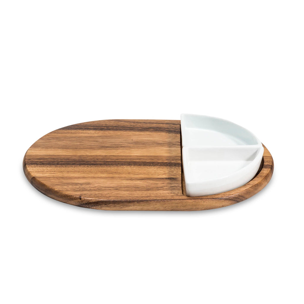 Wooden cutting board with a white ceramic knife holder on a white background