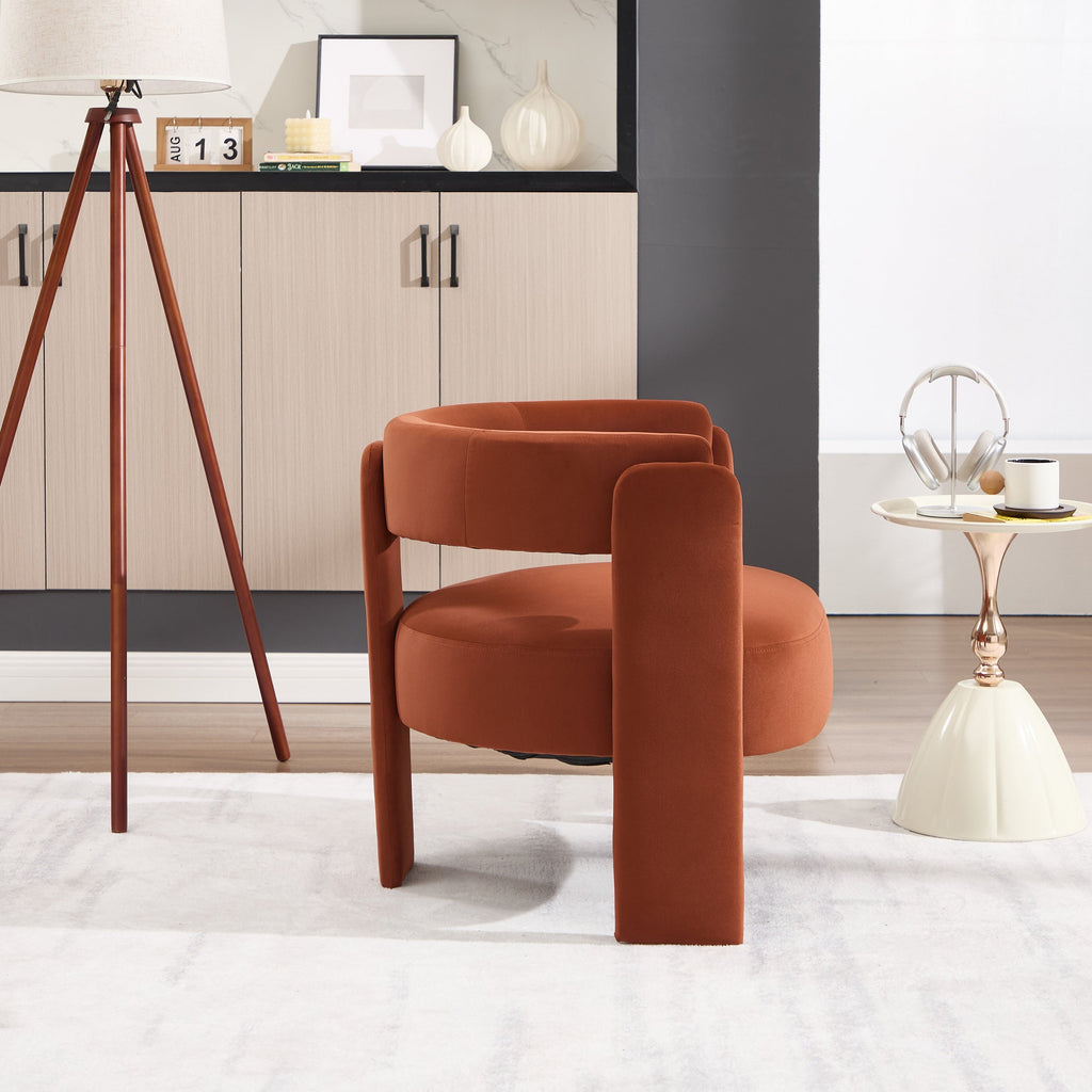 Modern orange chair in a stylish room with decor elements.