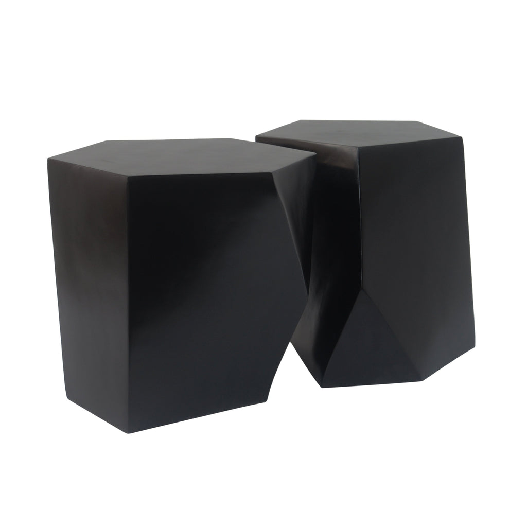 Two black geometrically shaped tables on a white background