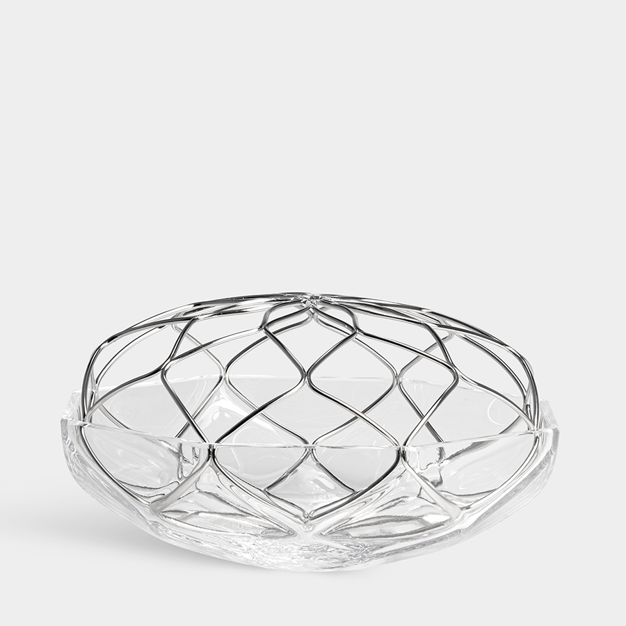 Clear glass bowl with geometric design on a white background