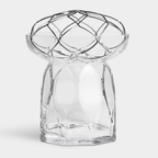 Clear glass diffuser with geometric design on a white background