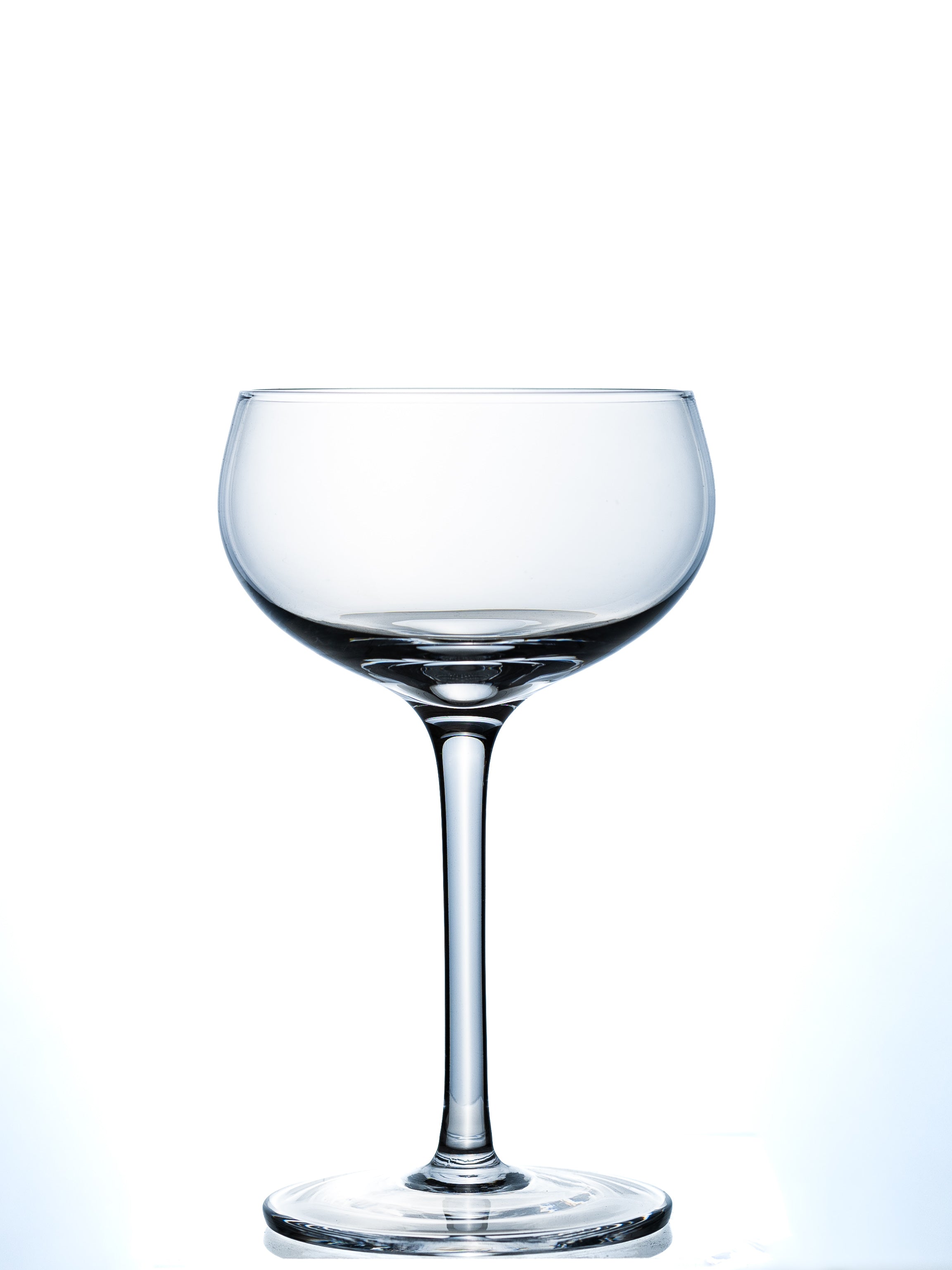 Clear glass wine glass on a white background