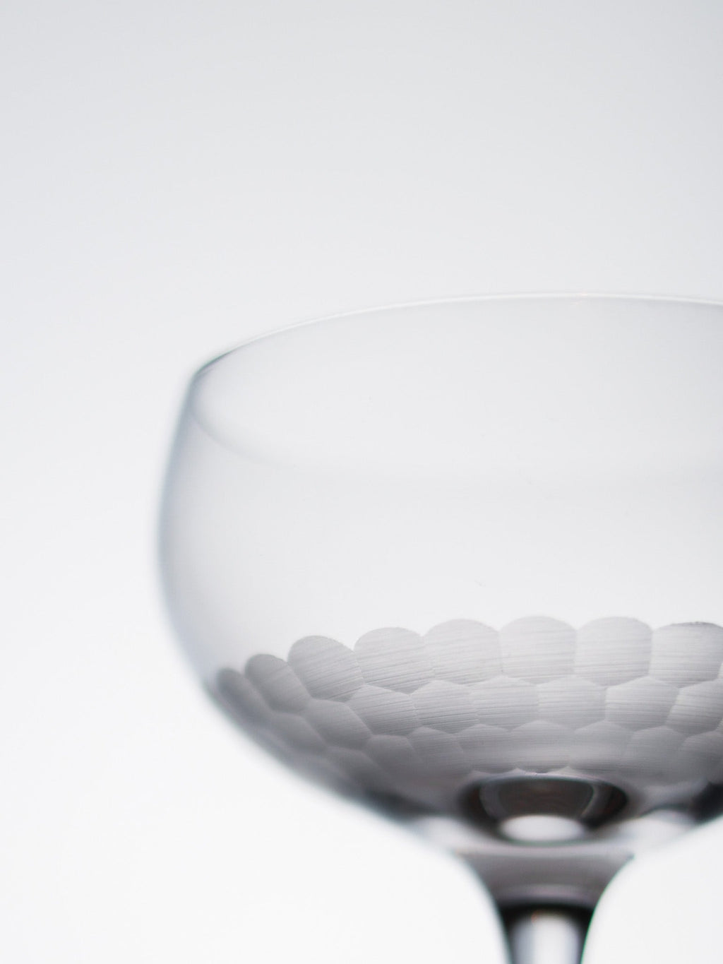 Close-up of a textured glass on a white background