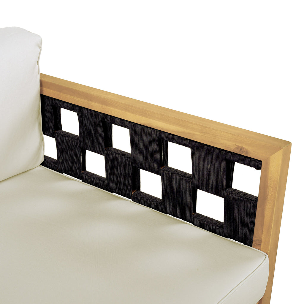 Section of a sofa with a wooden frame and black woven backrest on a white background