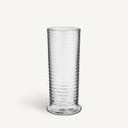 Clear glass with textured design on a white background