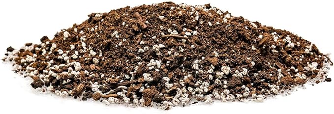 Mound of soil with small stones on a white background