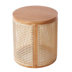 Round wooden side table with wicker pattern on a white background