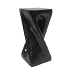 Black twisted side table on a white background