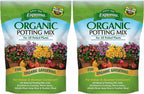 Two packages of Espoma Organic Potting Mix for potted plants on a white background.