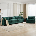Green sofa and armchair in a living room with light wood flooring and white walls.
