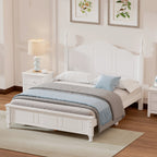 White wooden bed with bedding in a bedroom setting