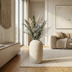 Living room with a vase of flowers on a coffee table