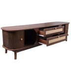 Wooden entertainment console with wicker drawers on a white background