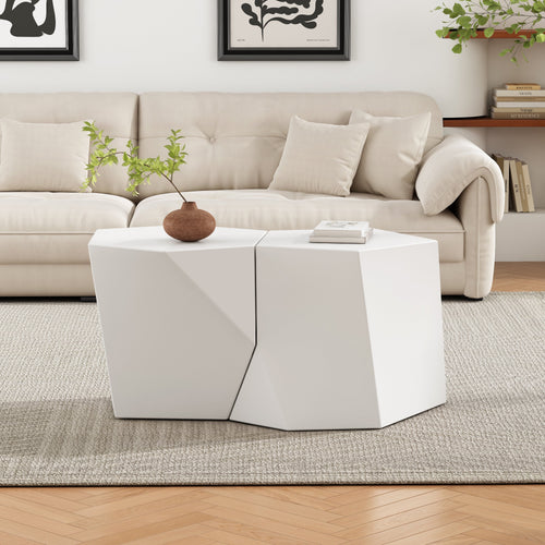 Modern living room with a beige sectional sofa, white coffee table, and decorative elements.