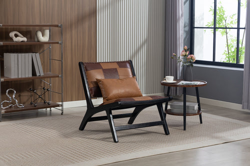 Modern living room with a brown and black chair, side table, and bookshelf.