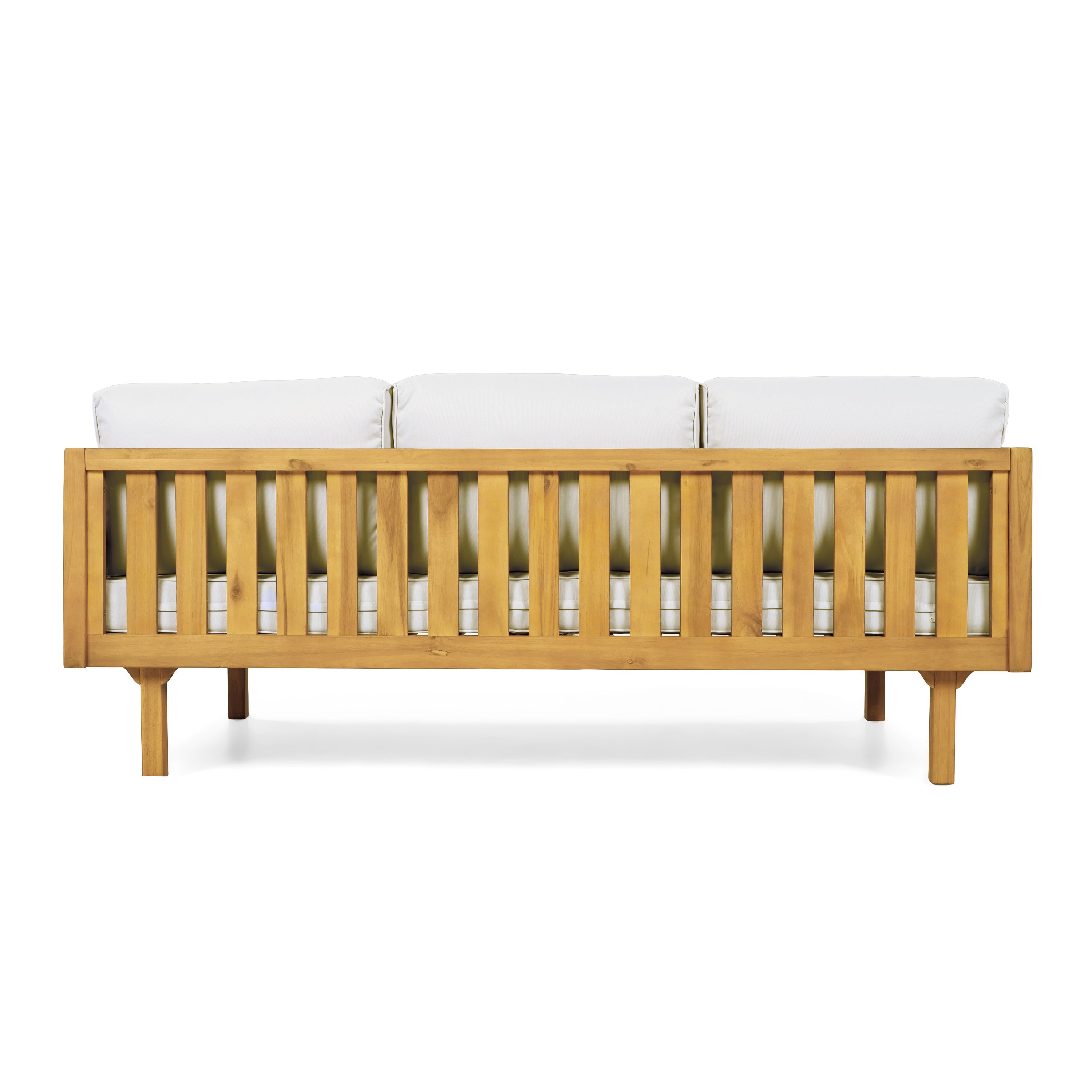 Wooden crib with white mattress on a white background
