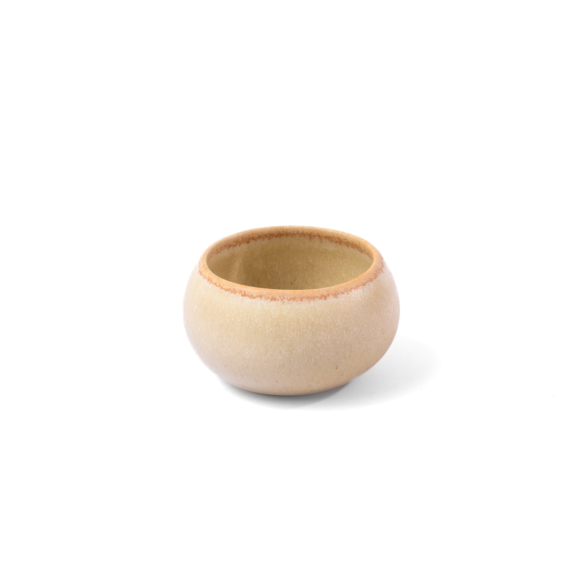 Small beige ceramic bowl on a white background