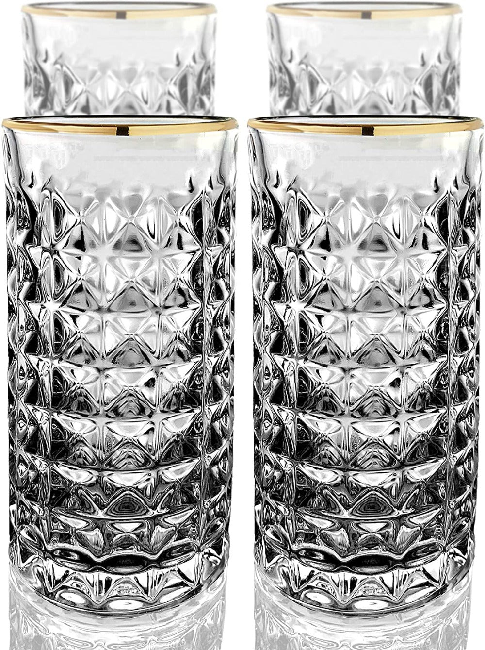 Set of four clear glass tumblers with gold rims on a white background