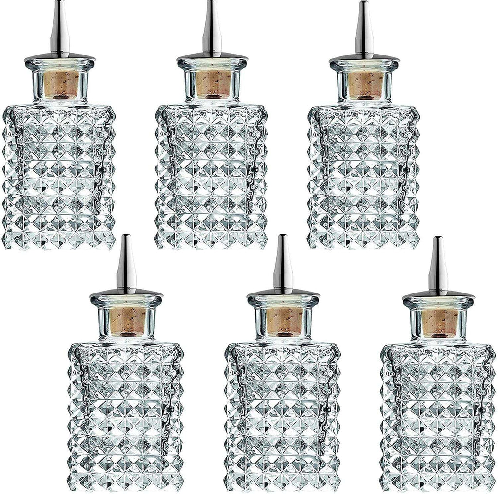 Set of six diamond-patterned glass bottles with cork stoppers on a white background