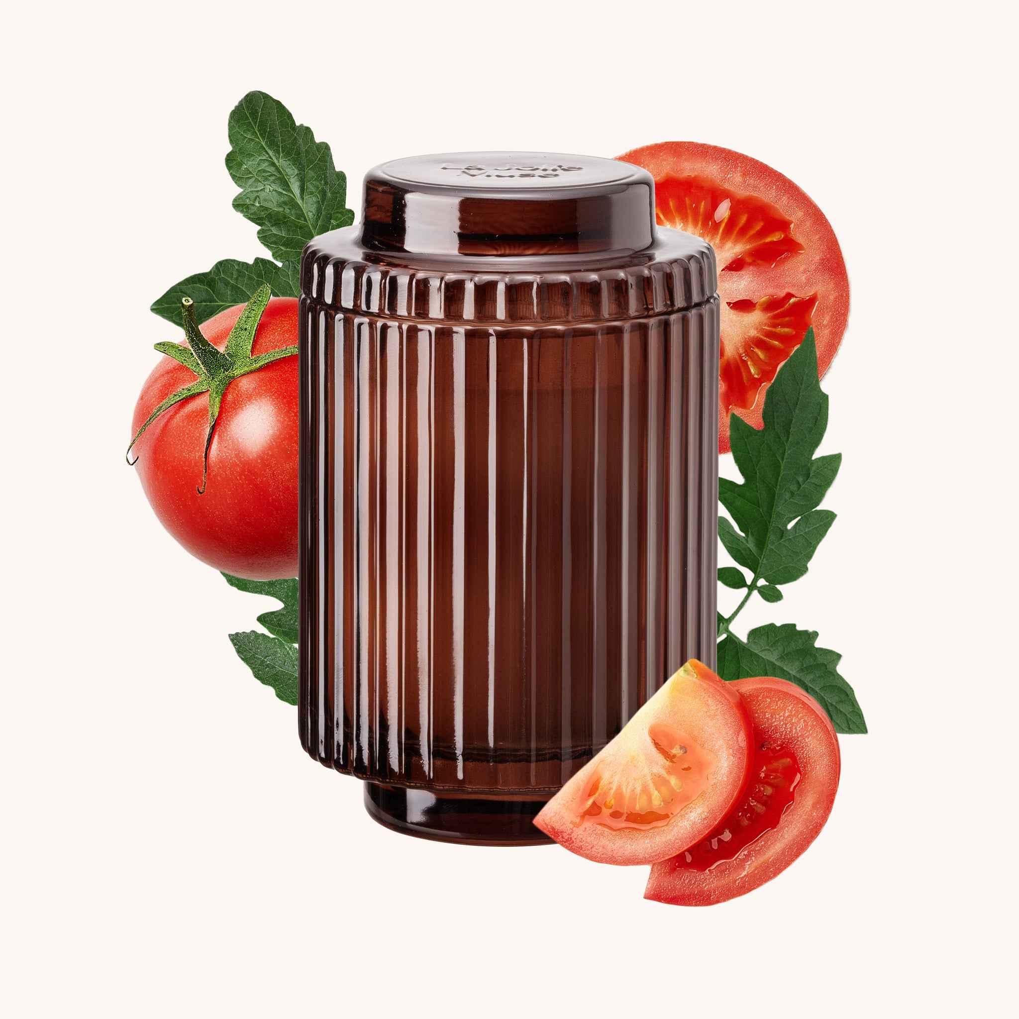 Brown cylindrical container with tomatoes and leaves on a white background