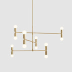 Modern chandelier with gold fixtures and white bulbs on a light gray background