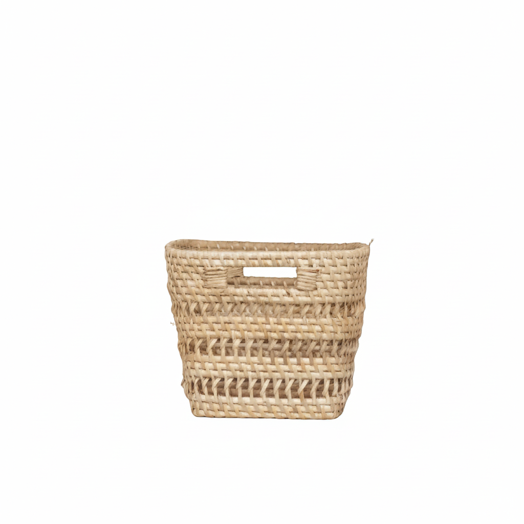 Woven rattan basket on a concrete surface with a neutral background