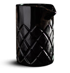 Black textured glass mixer on a white background