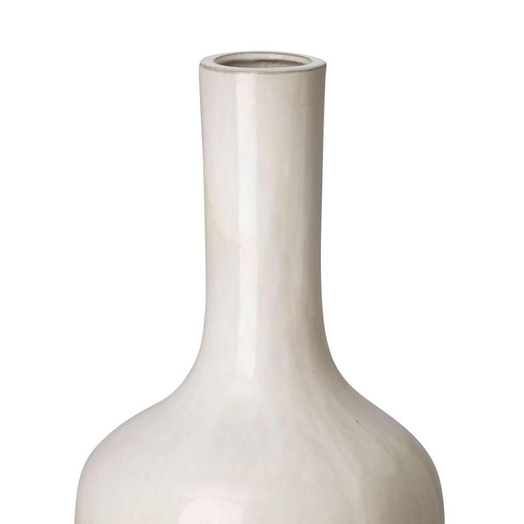 White ceramic vase on a white background