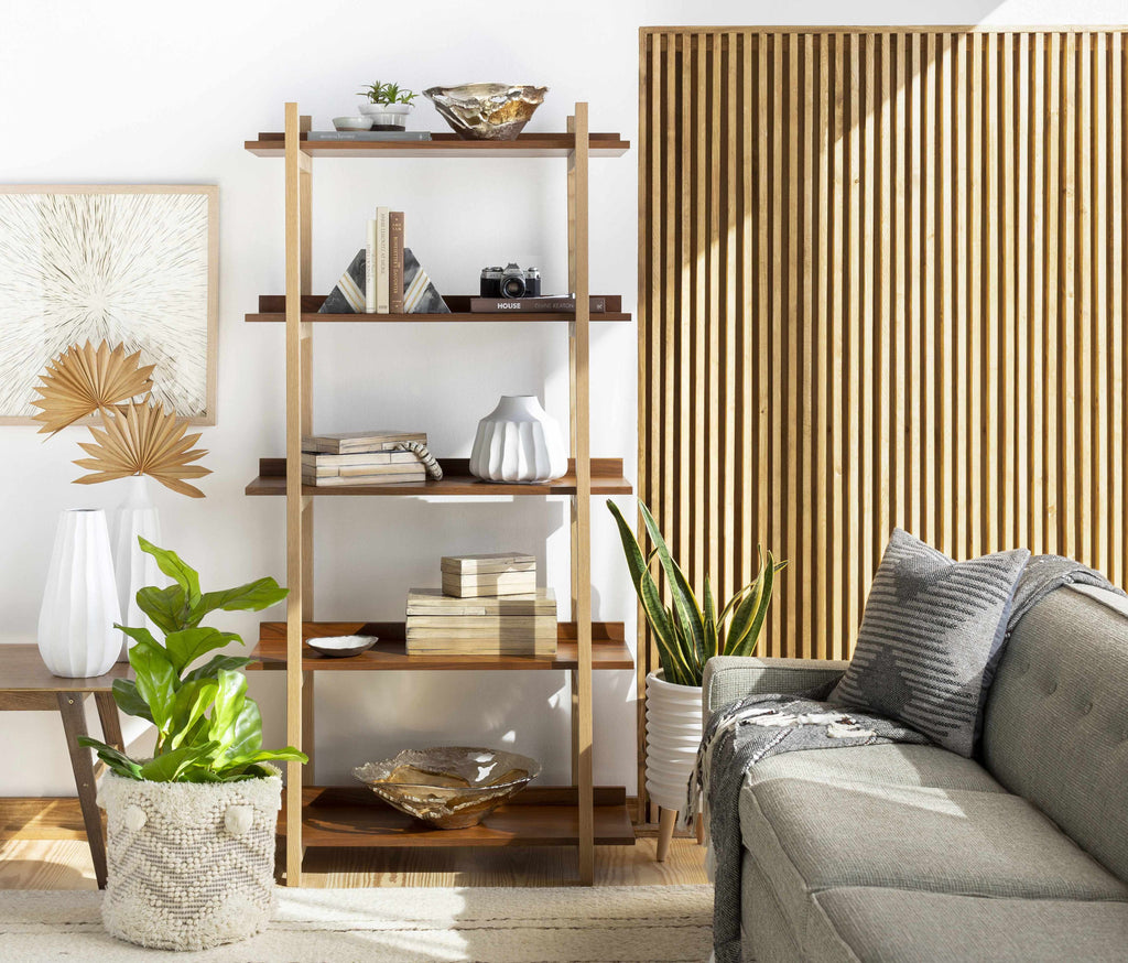 Living room with wooden shelf, gray sofa, and decorative items
