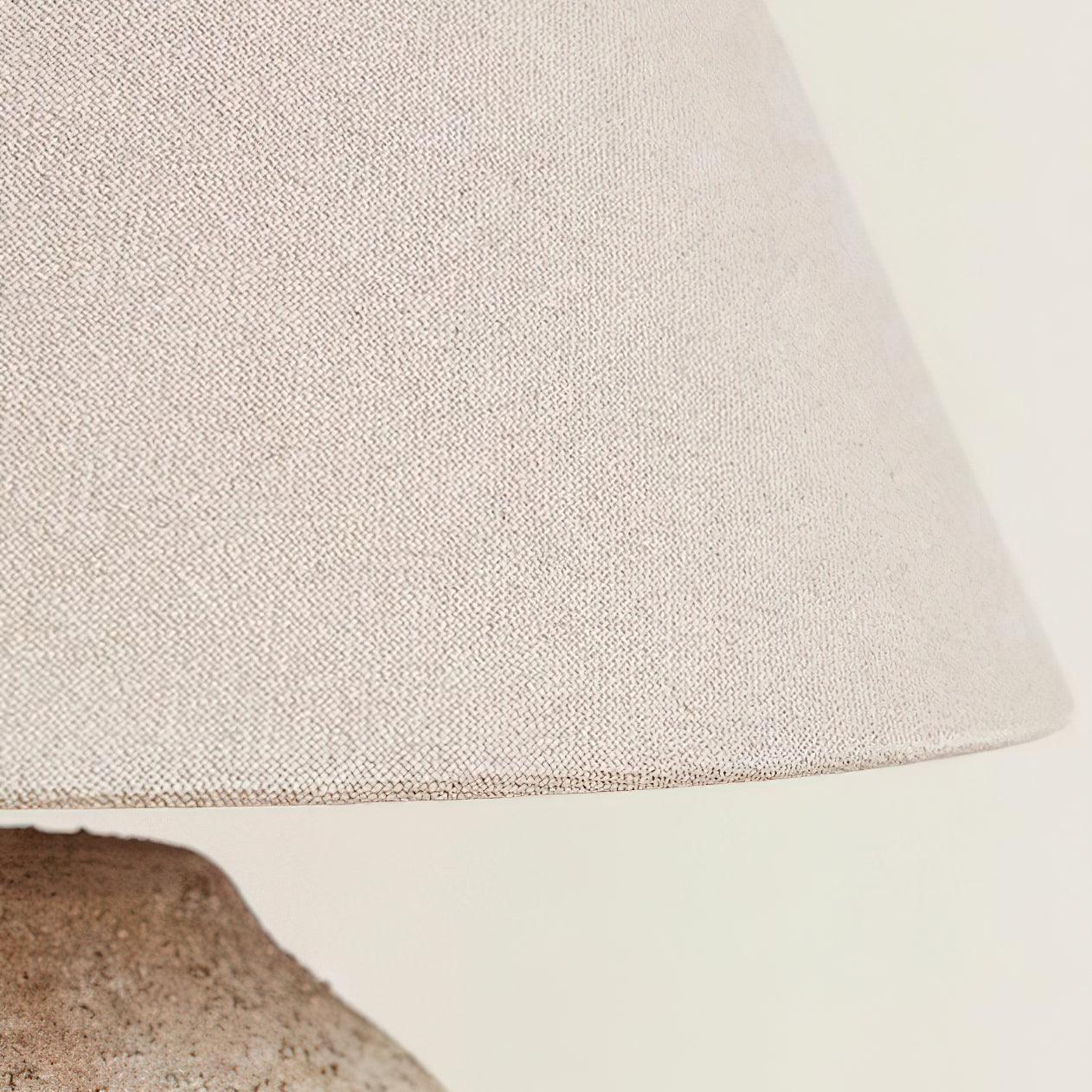 Close-up of a textured beige fabric surface
