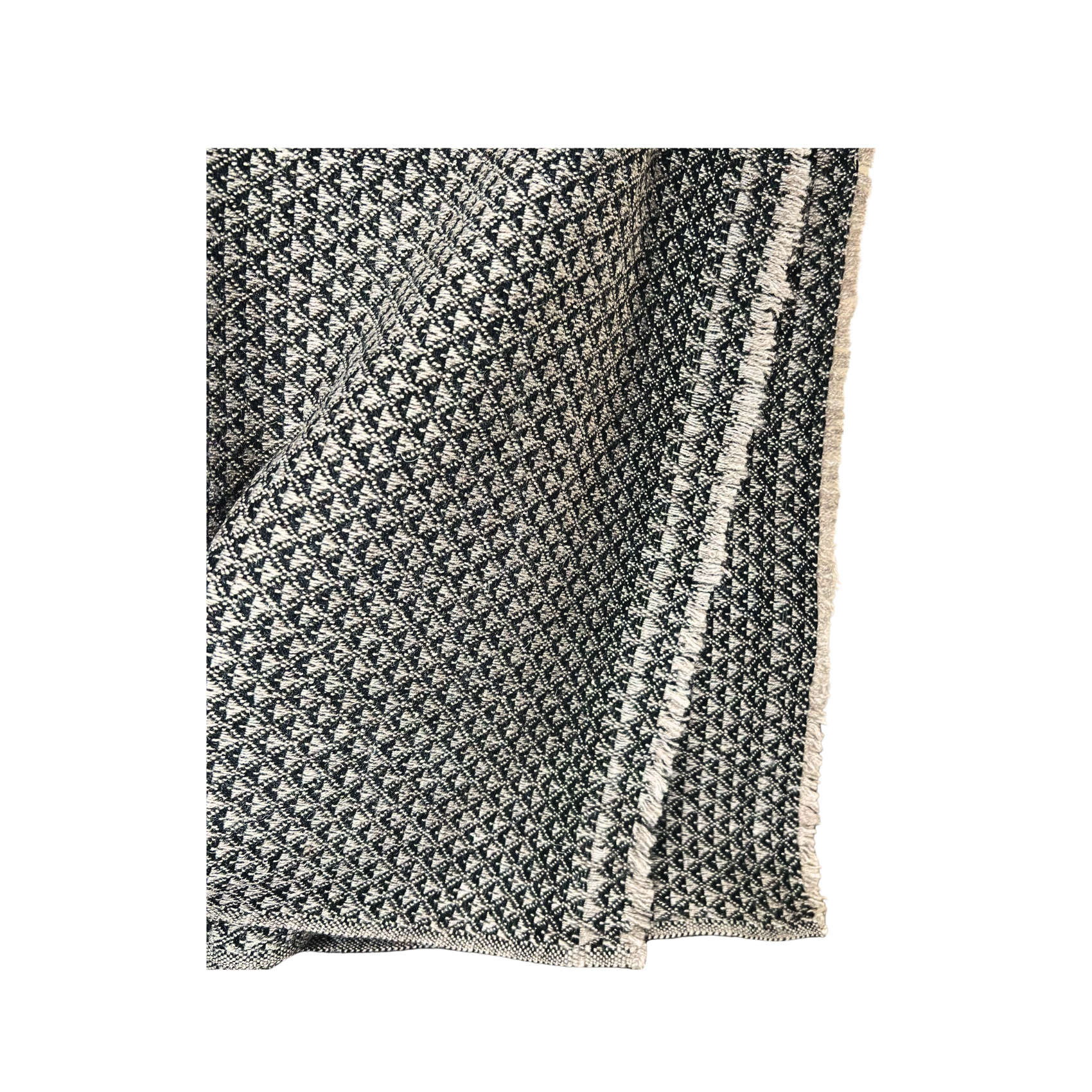 Textured blanket with geometric pattern on a white background