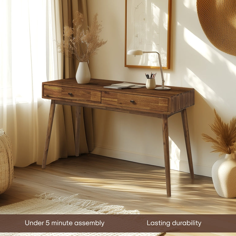 Wooden desk in a room with decorative elements and natural light.