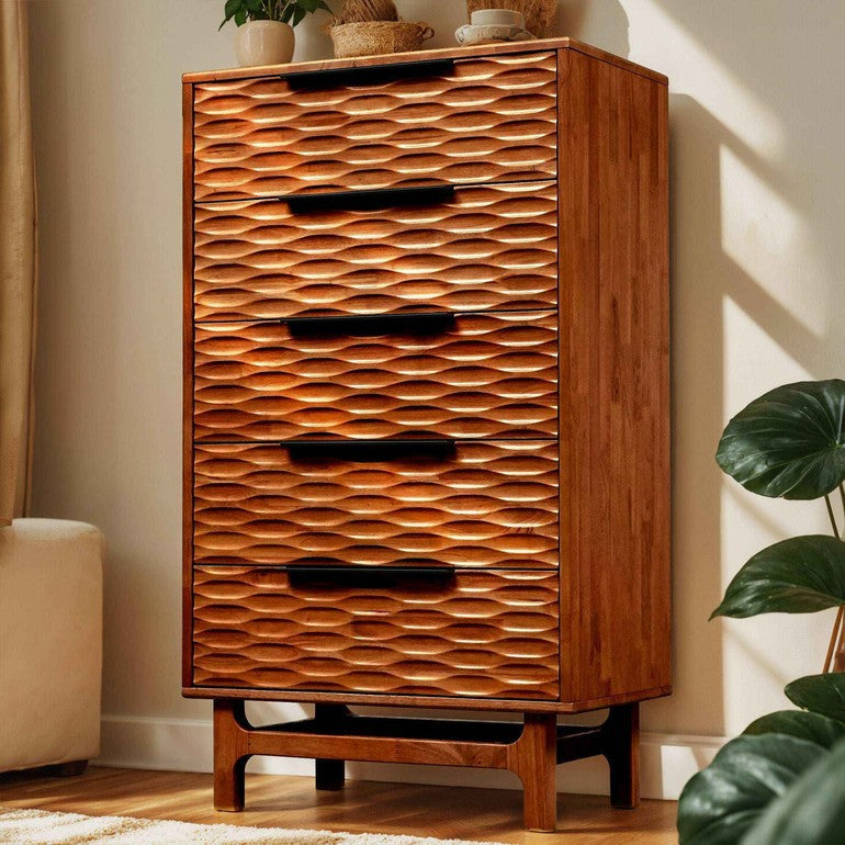 Wooden dresser with wavy pattern and black handles in a room setting.