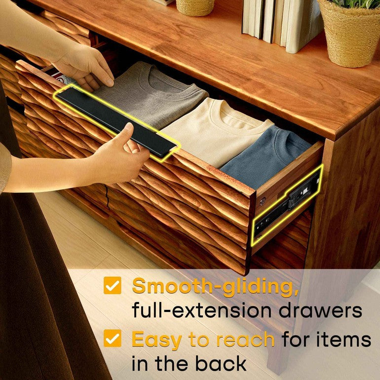 Wooden dresser with extendable drawers being used, highlighting smooth-gliding feature.