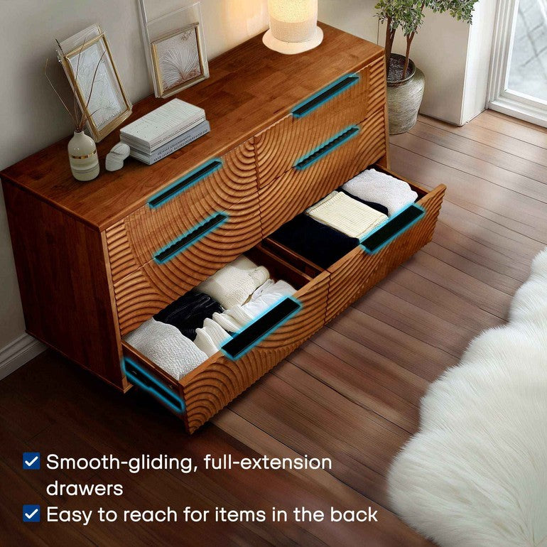 Wooden dresser with wavy design and open drawers in a room setting.