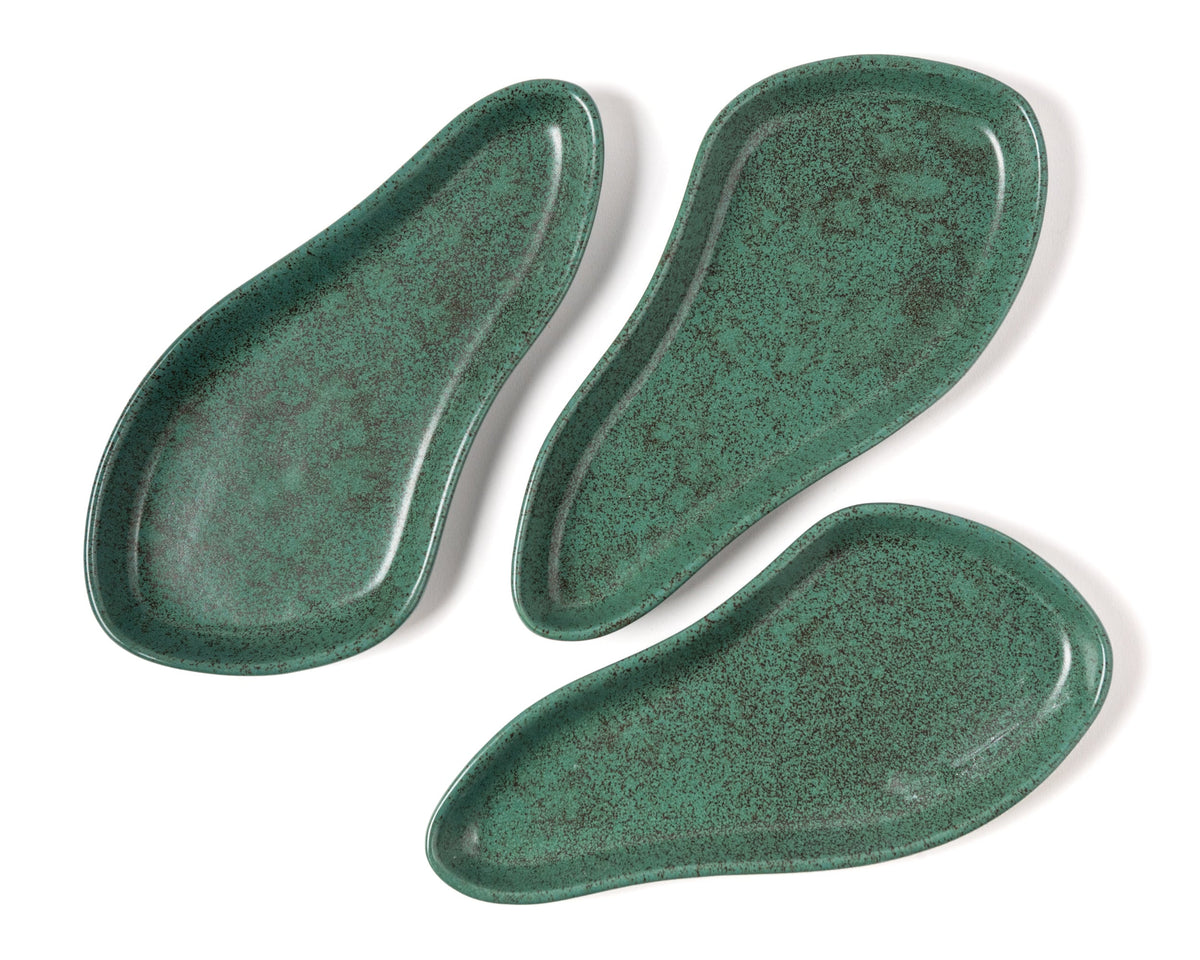 Three green ceramic plates on a white background 
