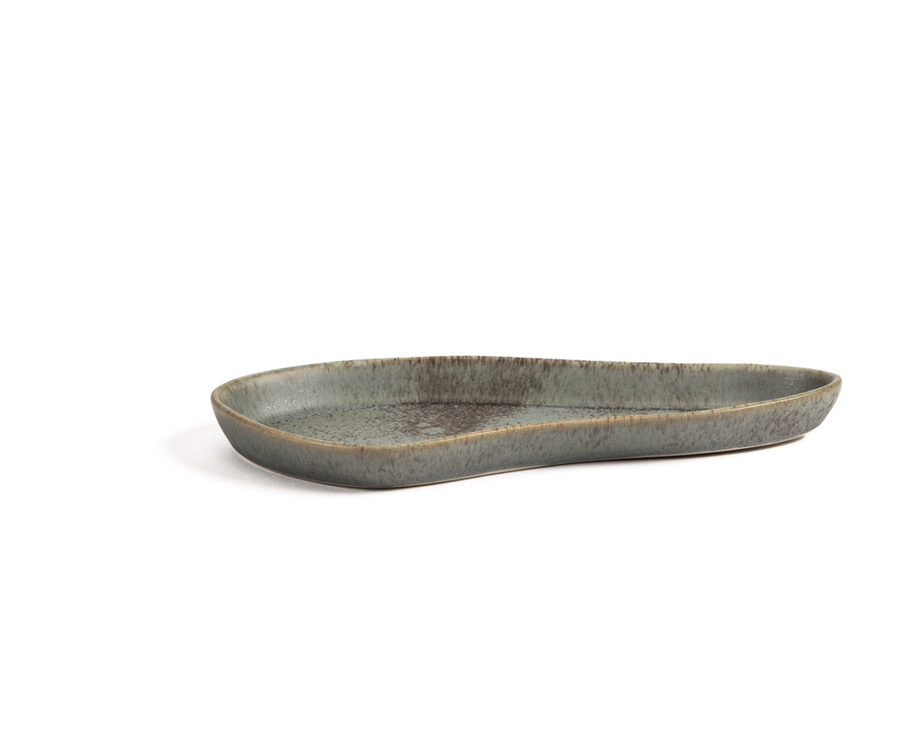 Green ceramic serving platter on a white background
