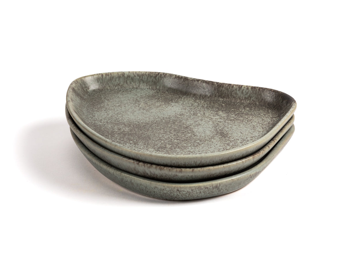Set of three gray ceramic plates on a white background