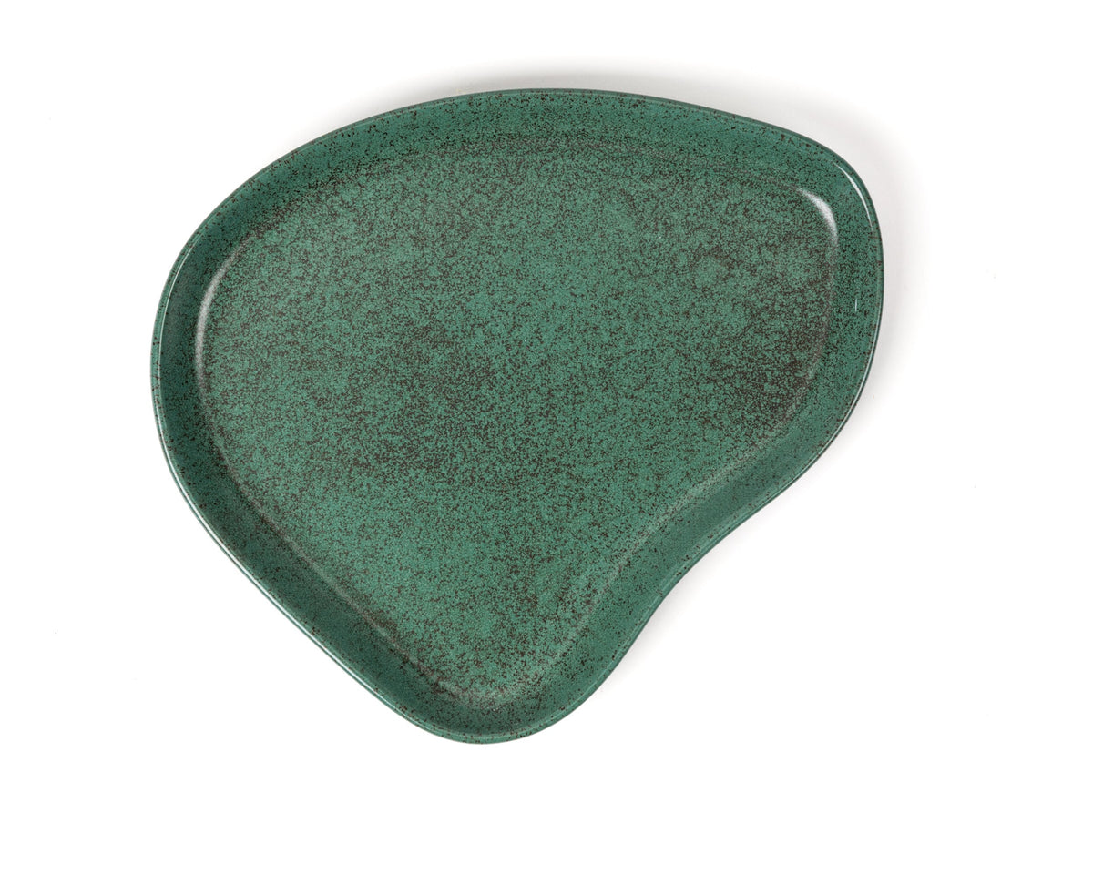 Green ceramic dish on a white background