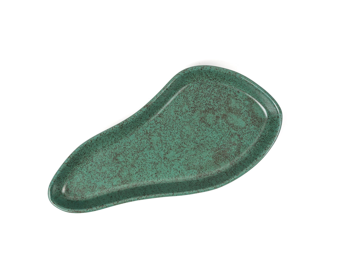 Green ceramic dish on a white background