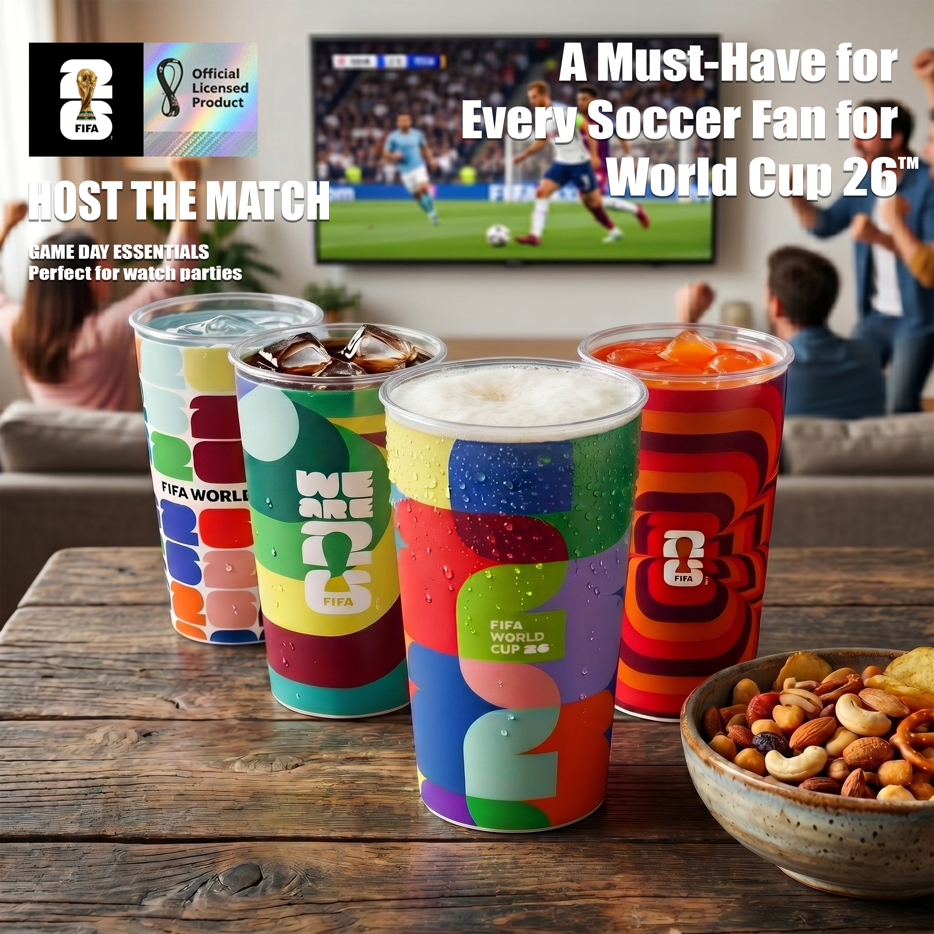 Colorful FIFA World Cup-themed cups on a table with snacks, TV in the background showing soccer game.