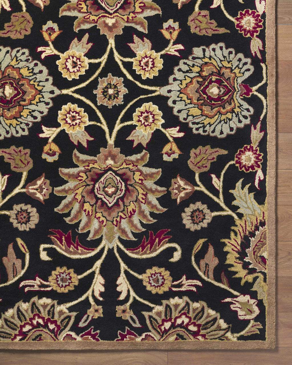 Decorative floral rug with intricate patterns on a dark background