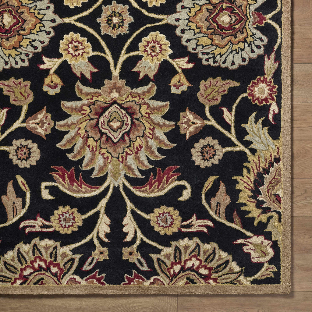 Decorative floral-patterned rug on a wooden floor