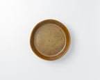 Brown ceramic plate on a white background