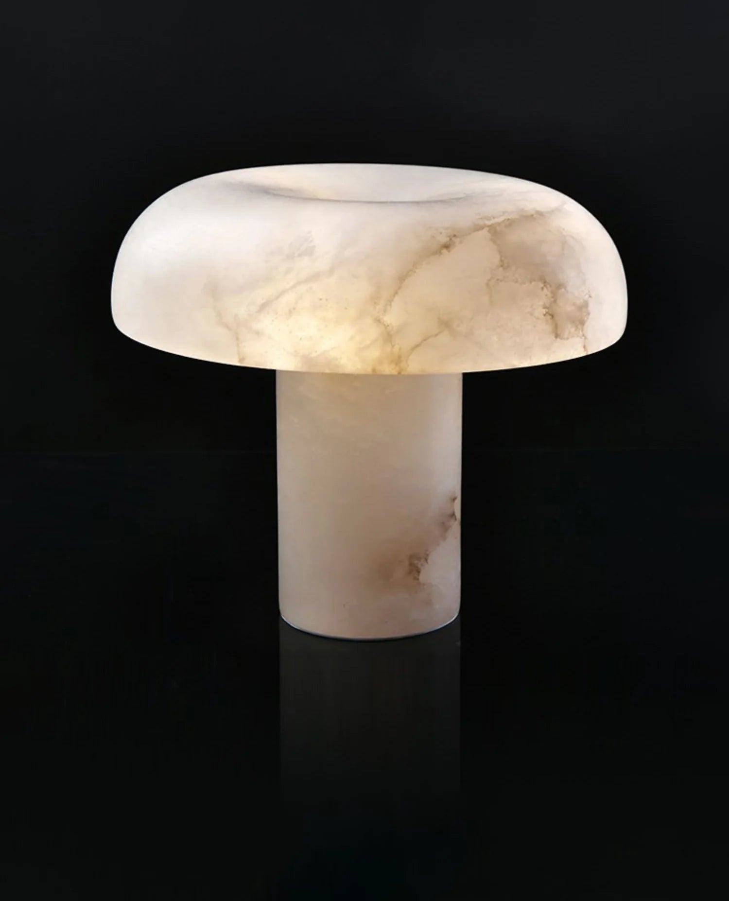 Marble-textured mushroom-shaped lamp on a black background