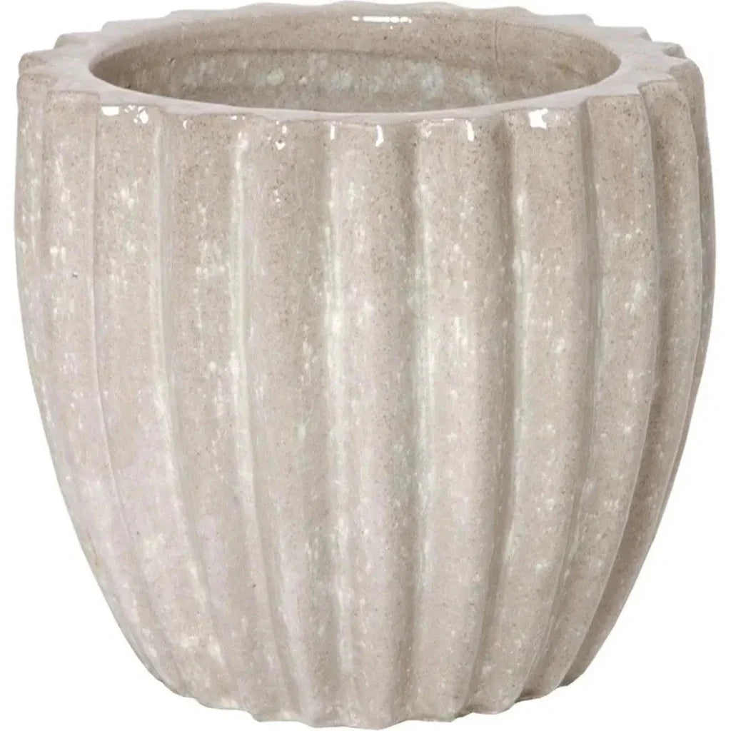 Textured beige pot on a white background