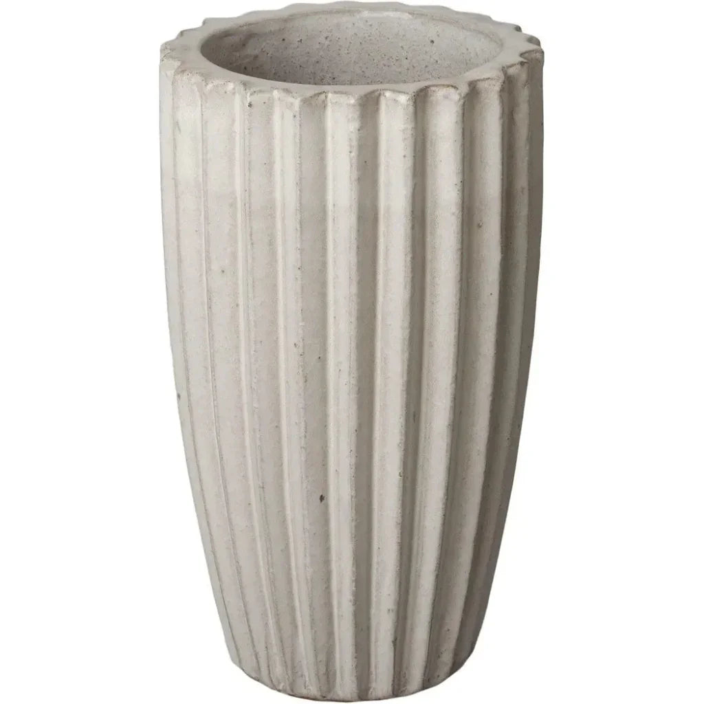 Concrete planter with ribbed texture on a white background