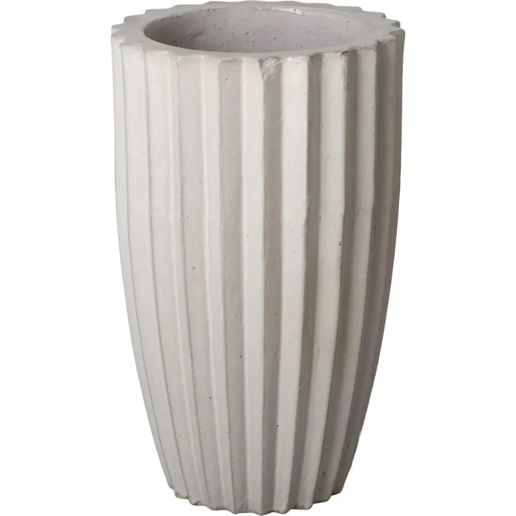 Concrete planter with vertical ribbed design on a white background