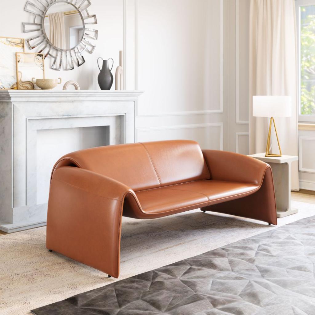 Brown leather sofa in a stylish living room with a fireplace and decorative items.
