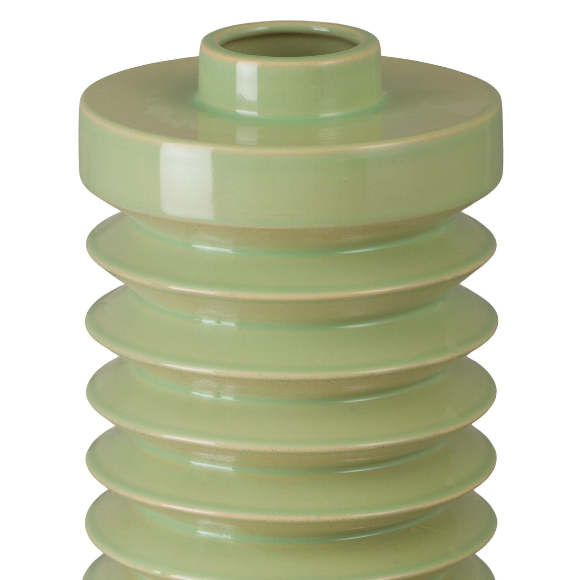 Green ceramic vase with stacked cylindrical design on a white background